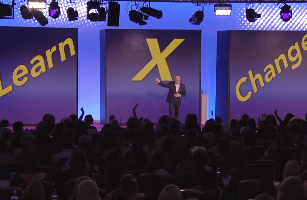 Michael Heppell teaching a point on stage